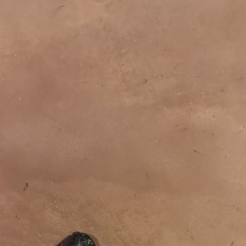 Macro d'un dégradé de teinte sur enduit